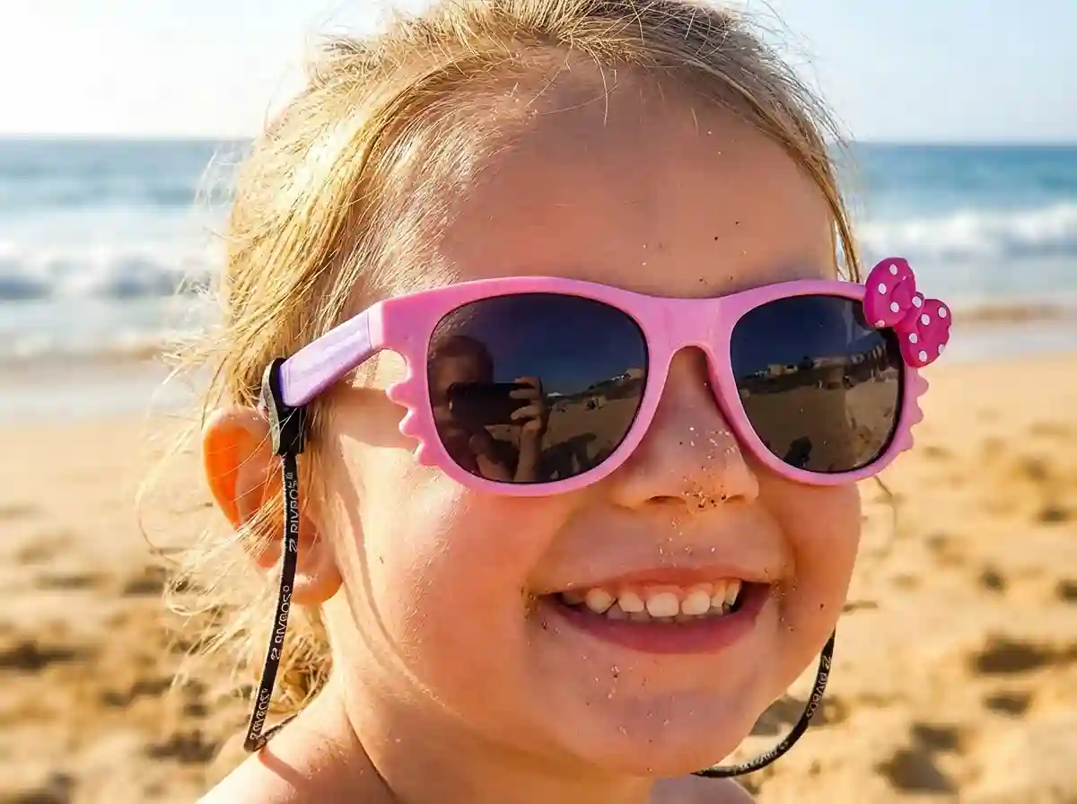RIVBOS brand story — children wearing UV400 sunglasses enjoying outdoor adventures